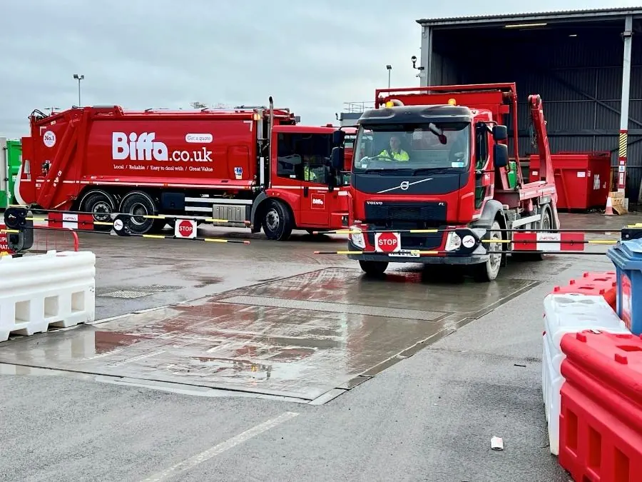 Biffa refuse lorries passing through Dofygate automatic traffic barriers