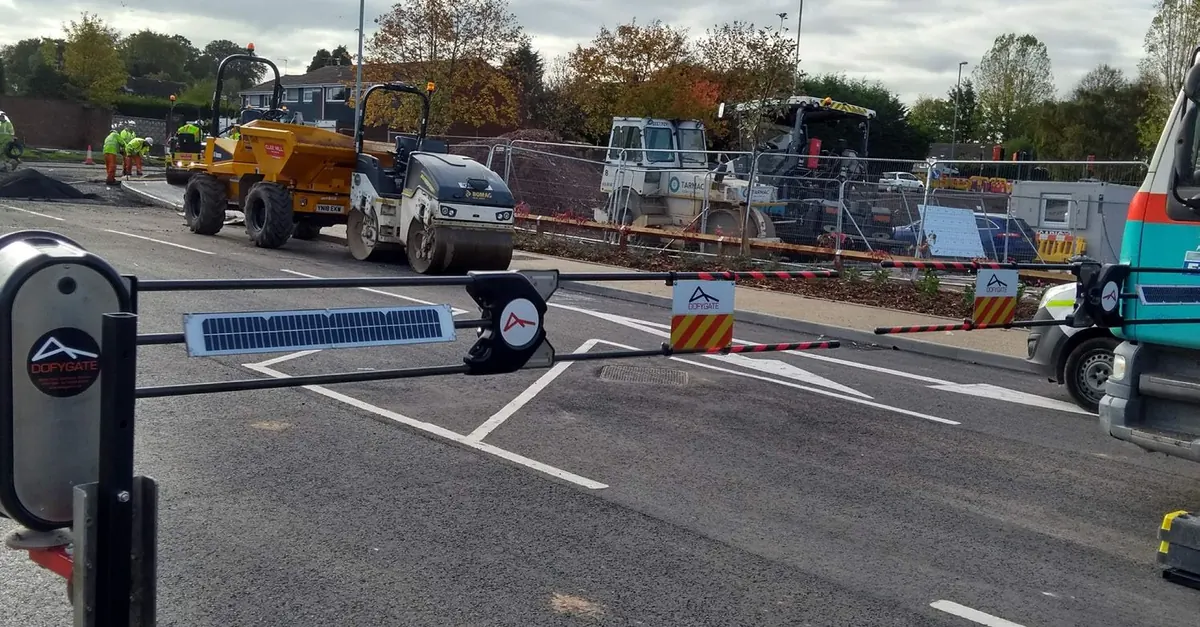 Dofygate solar powered barrier across a works compound entrance