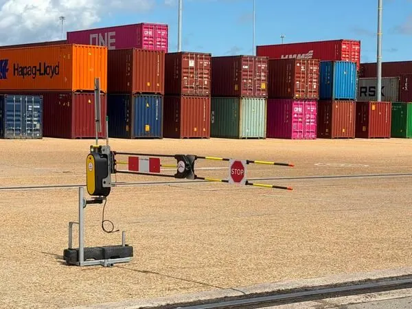 Dofygate 4 automatic traffic barrier on a wheeled base at a container terminal