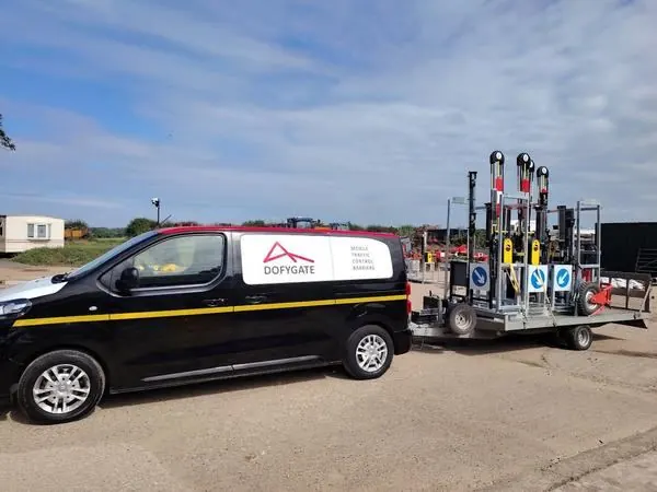 Dofygate van and trailer bringing lightweight barriers to an equestrian event